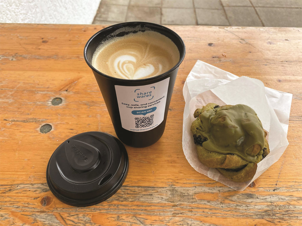 Open ShareWares mug with breakfast.